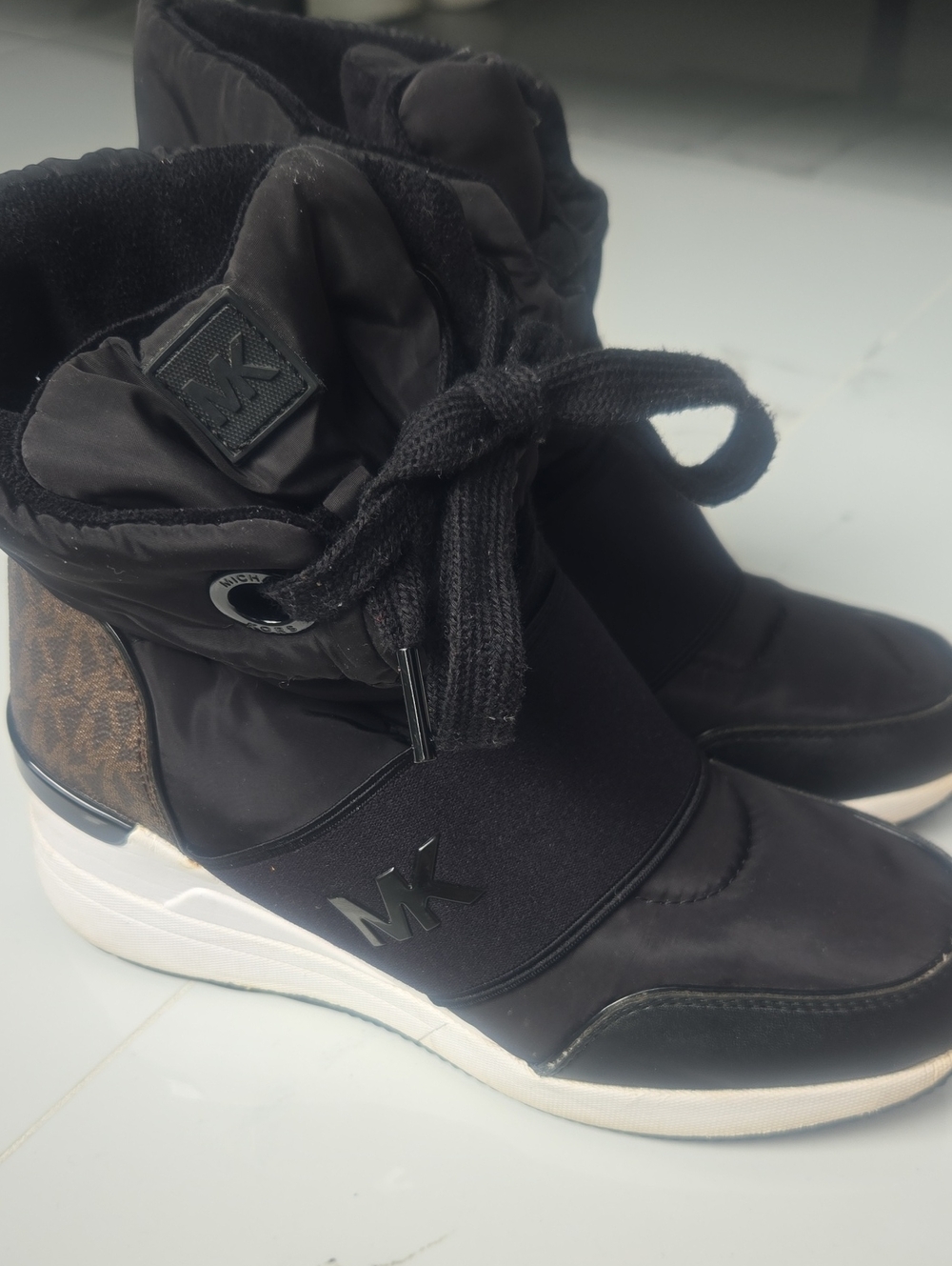 Michael Kors Black High-Top Wedge Sneakers with Signature MK Trim
